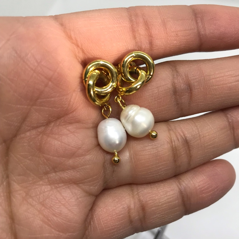Gold tone and faux pearl dangle earrings